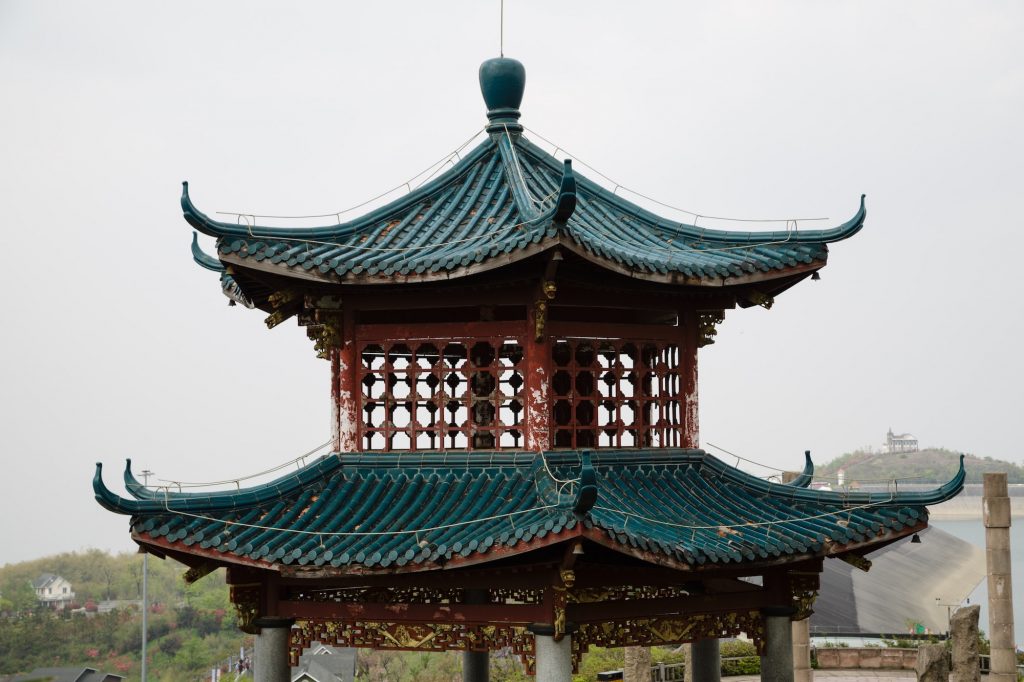 Traditional old architecture in China. Beautiful pagoda with blue roof
